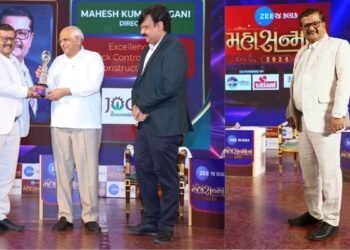 Mahesh Kumar Jogani of Jogani Reinforcement proudly accepts a prestigious award presented by the Honorable Chief Minister of Gujarat, Shri Bhupendra Patel
