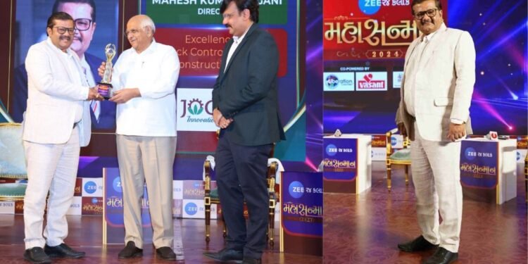 Mahesh Kumar Jogani of Jogani Reinforcement proudly accepts a prestigious award presented by the Honorable Chief Minister of Gujarat, Shri Bhupendra Patel