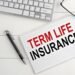 What are the key benefits of buying a term life insurance policy early?